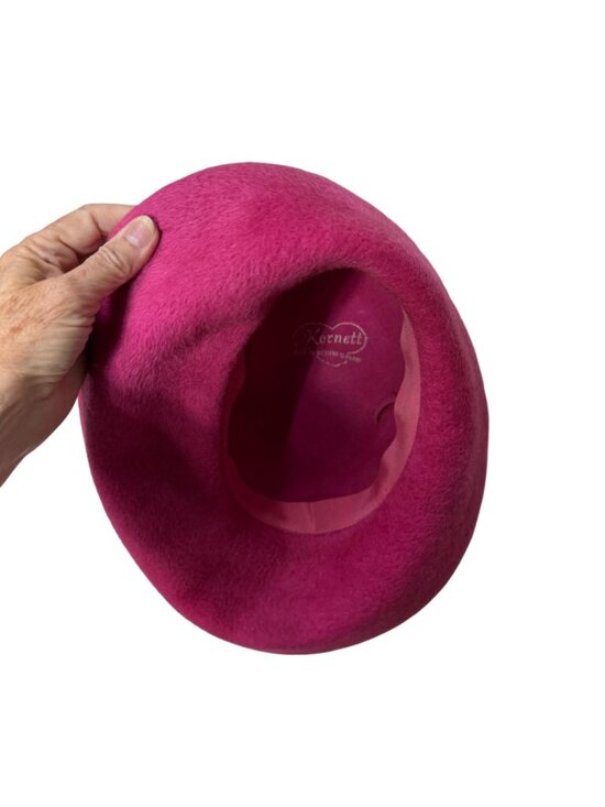 1960s pink hat in fur felt with asymmetrical brim and rhinestone accent by Kutz